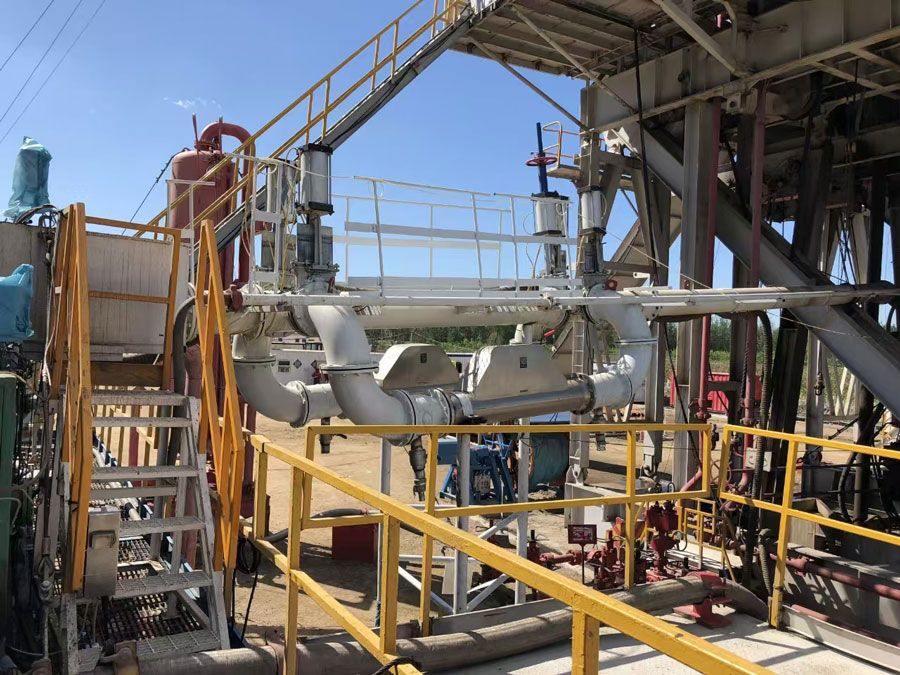 Coriolis flow meter for mining slurry mass flow measurement